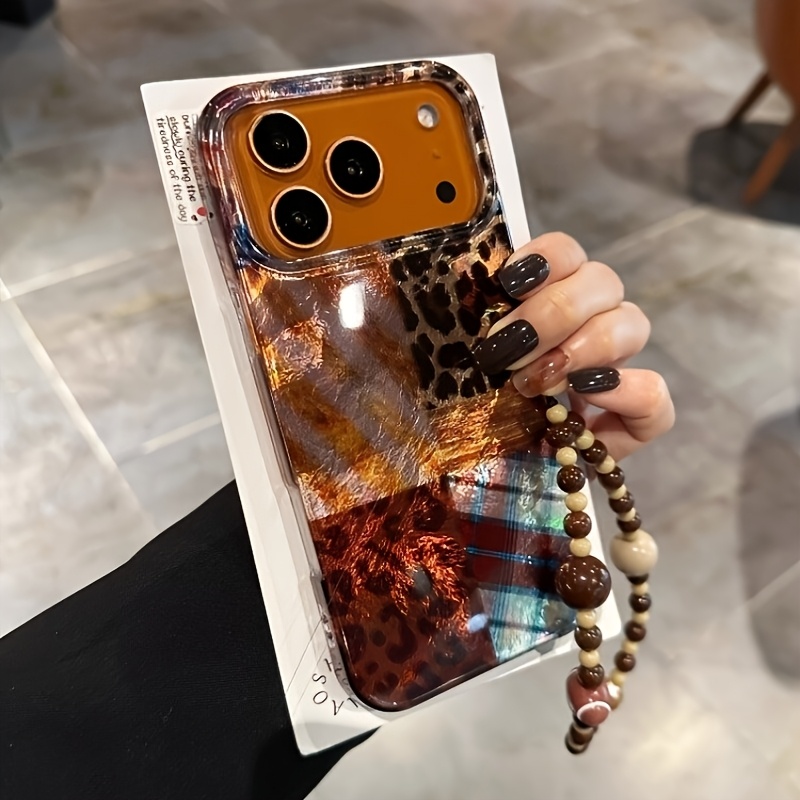 TEMU Coque de téléphone - Cette coque de téléphone arbore un design imprimé léopard avec un cordon marron, compatible avec divers modèles d'iPhone,