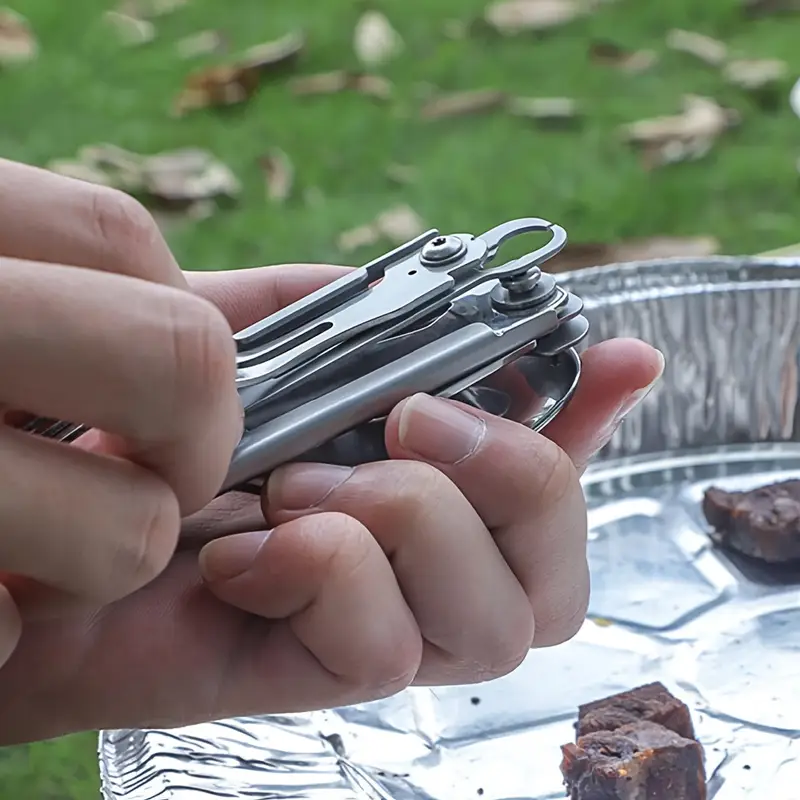a versatile folding outdoor tableware set with 5 in 1 including knife bottle opener made of stainless steel easy to clean and with a storage bag camping details 1