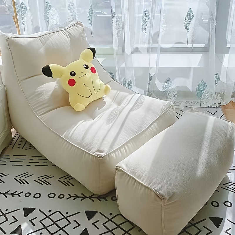 A Comfortable Sofa That Can Be Adjusted for Reclining Or Sleeping, a Single-Person Lounge Chair, a Small Tatami Bed for Humans Resembling a Dog Bed, And a Bean Bag Lounge Chair