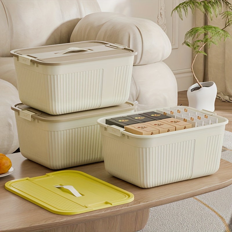 three lidded plastic storage boxes stackable organizing containers with snap seals and handles suitable for home storage for in closets kitchens bedrooms and living rooms in cream yellow measuring 38 5 28 5 18 5cm Product details 5