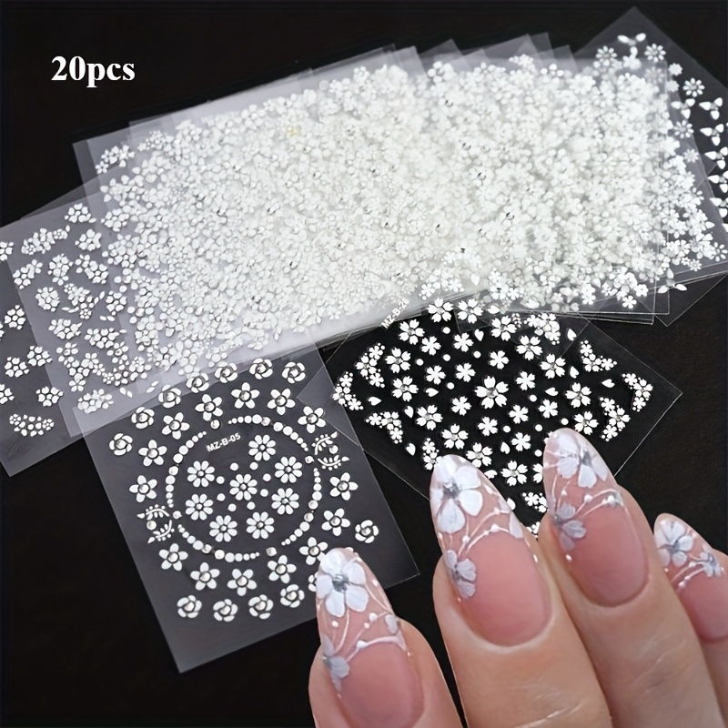 Image of 20 Sheets Of Self-adhesive 3d Holographic Nail Stickers Featuring White Flowers And Patterns, Perfect For Nail Art And Women's Nail Decoration