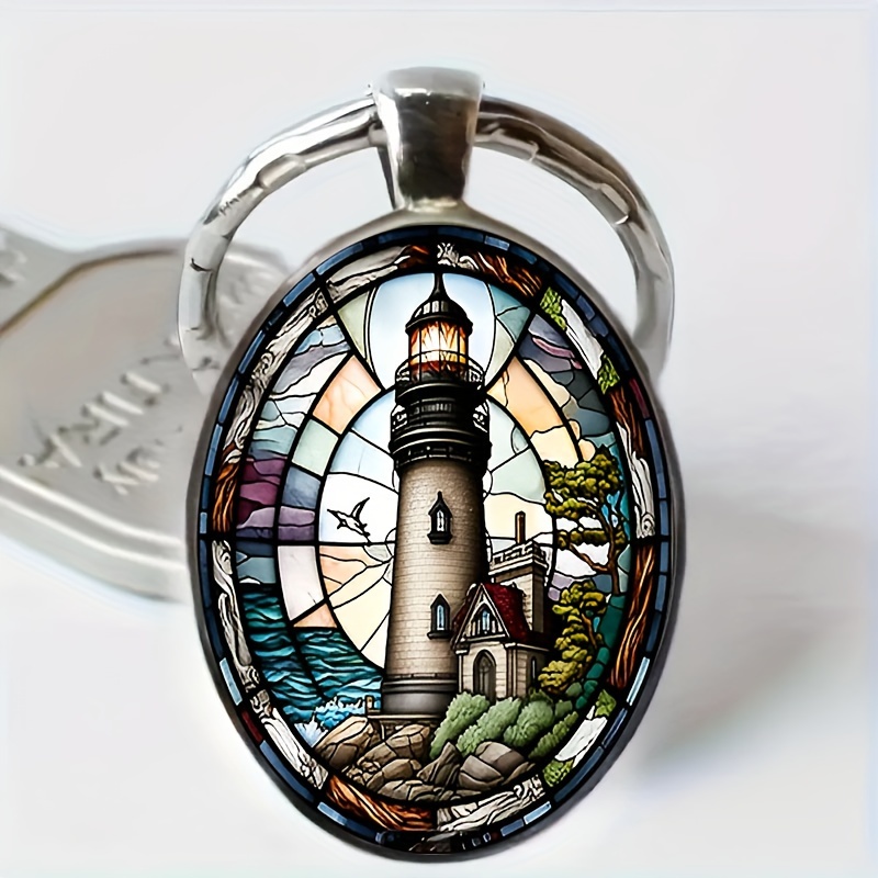 

1pc Fashionable And Elegant Lighthouse Pattern Oval Alloy Glass Keychain, Perfect Accessory For Birthday Gifts And Party Celebrations