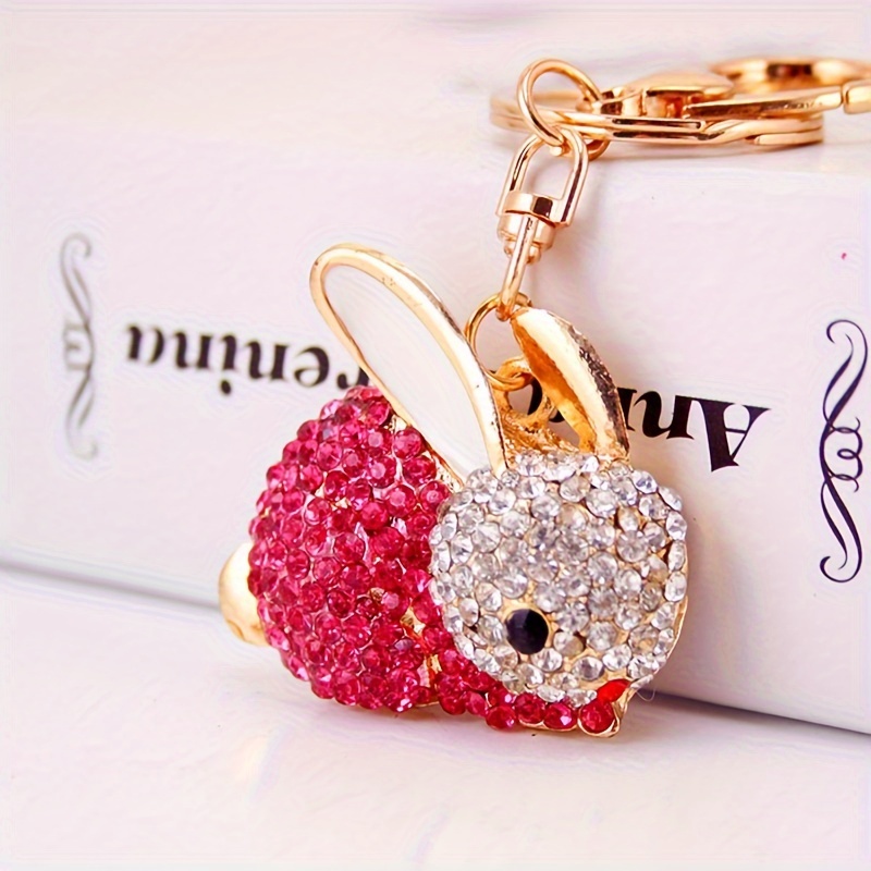 A Cute Cartoon Rabbit Keychain With Rhinestones, A Metal Accessory For Women's Bags Featuring A Small Bunny