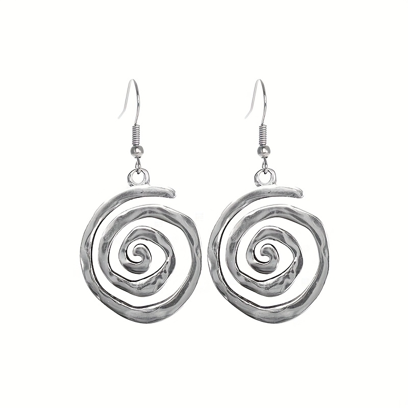 A Pair Of Creative And Stylish Drop Earrings With A Bohemian , Featuring A Vintage Hollowed-, Wear And Parties