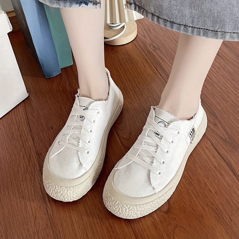 womens casual slip sneakers light blue fabric upper white Temu