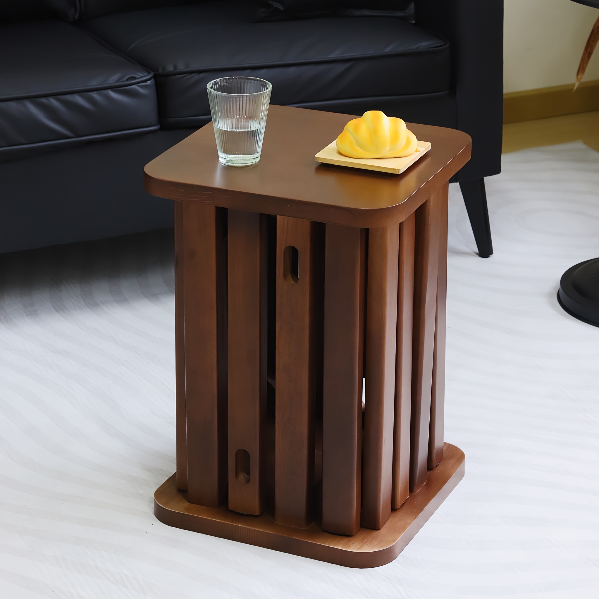 Image of 4 Dining Chairs Transformed Into Table. Wood Stools Stacked For Home Stacking. The Living Room Dining Table Is A Low Square Stool. The Dining Chair Is A Stool For Guests