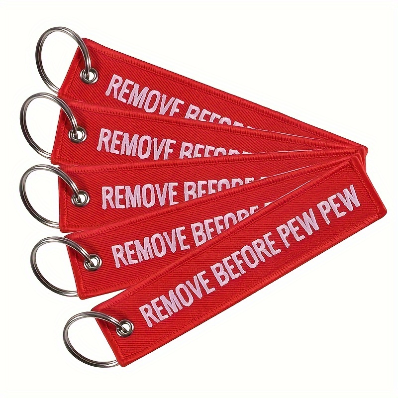 

5pcs/lot Fashion Red Remove Before Pew Pew Embroidery Keychain For Men, Remove Before Flight Keychain For Aviation, Luggage Tag Key Chain