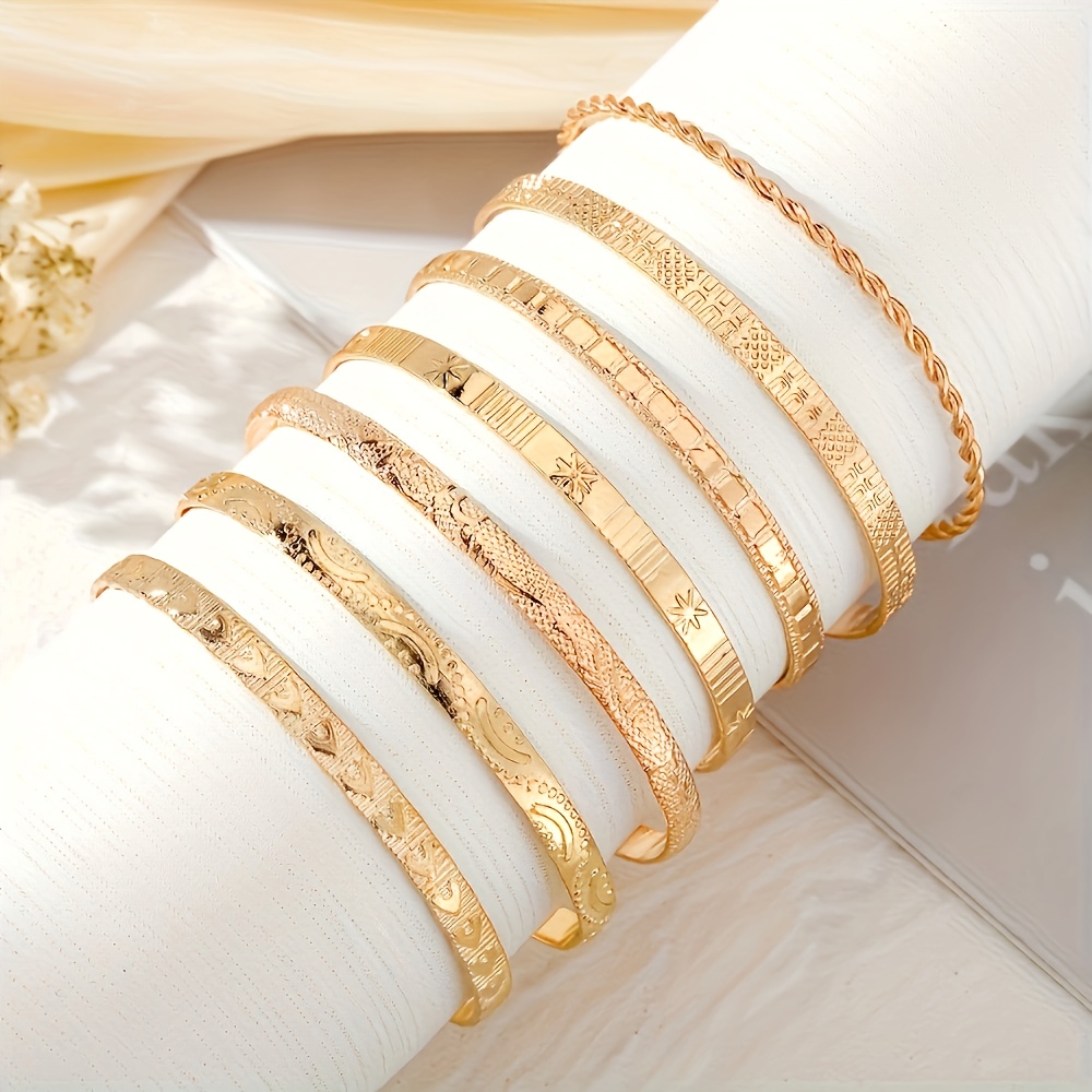 Image of 7pcs Minimalist Elegant Star Twisted Cuff Bracelet Set, Bohemian Style Heart Pattern Stacked Close-fitting Jewelry, Suitable For Daily Wear And Bracelets