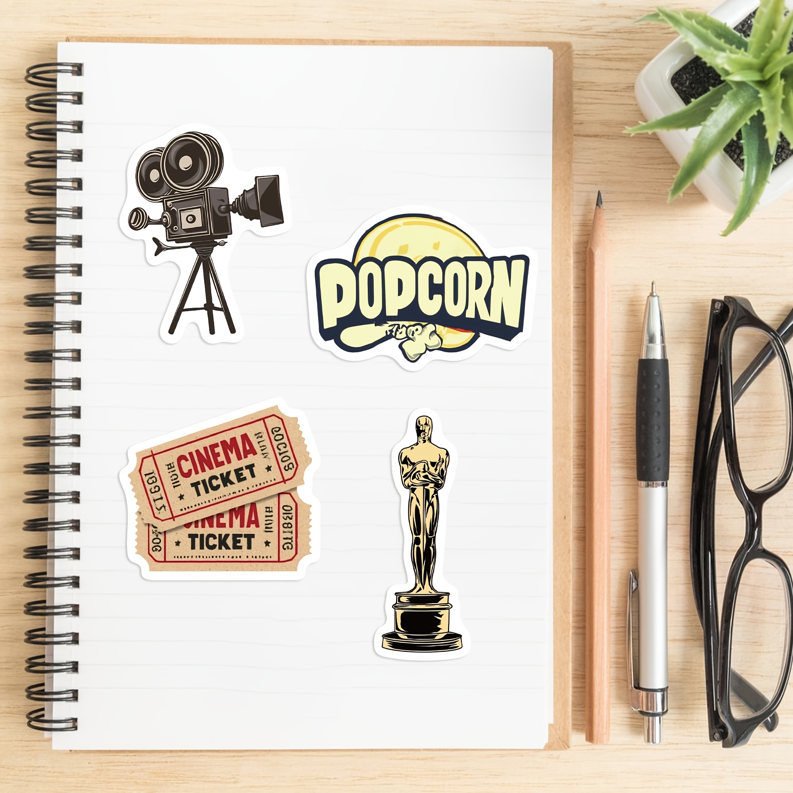 Image of 50pcs Graffiti Movie Theater Themed Stickers | Cartoon Film Reel, Tape Recorder, Non-repeatable Decor For Notebooks, Laptops, Motorcycles, Skateboards | Vinyl, Self-adhesive, Single Use