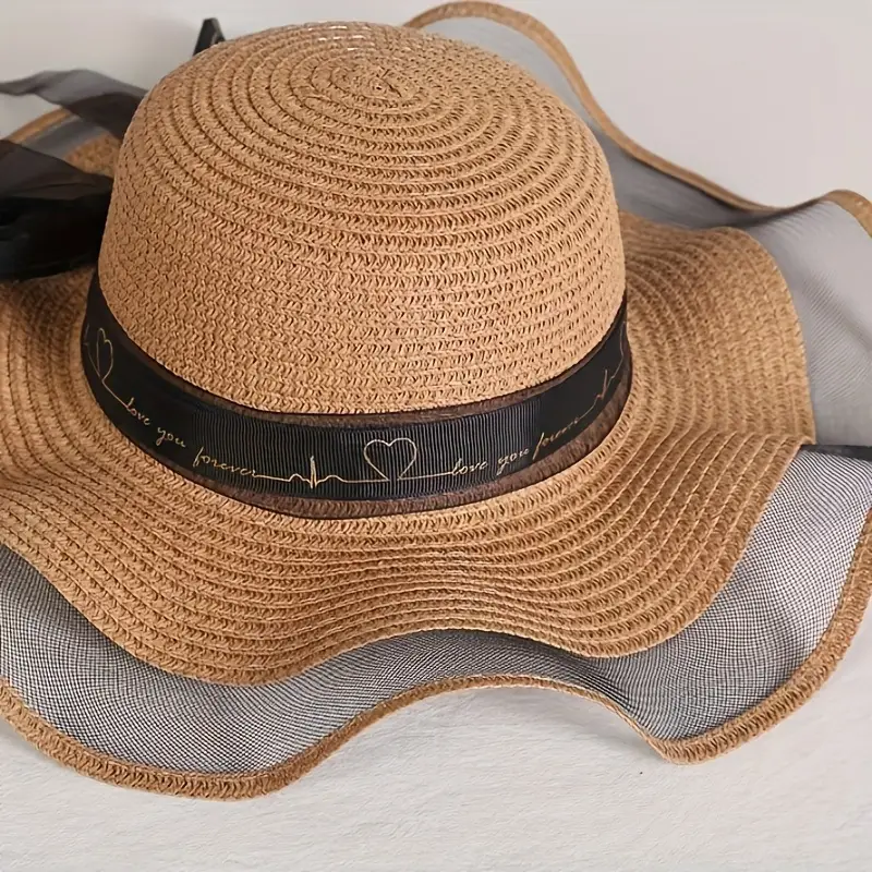 elegant wide brim sun hat with bowknot uv protection breathable straw beach cap for for outdoor leisure details 4