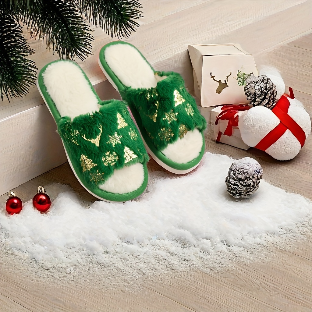 par de zapatillas navideñas de peluche con de dibujos animados
