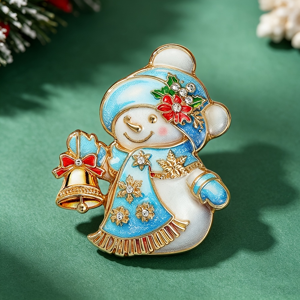 TEMU 1 pièce Broche strass de neige avec clochette, pompon et écharpe multicolores, motif de neige en émail, épingle pour pull, accessoire de tenue