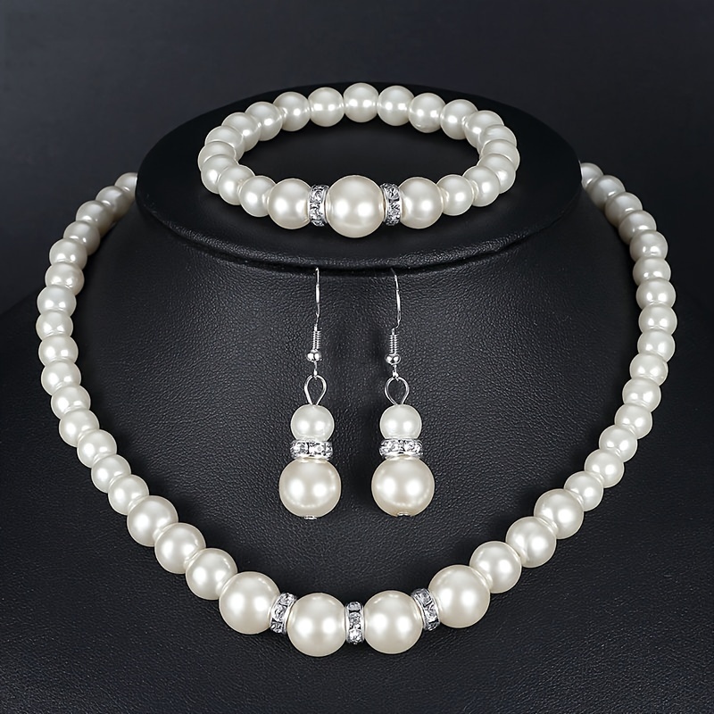 

Elegant Bohemian Pearl Jewelry Set For Women, Including Necklace, Earrings, And Bracelet - Beautiful Wedding Accessory
