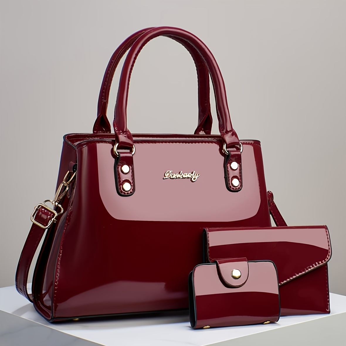 Trendy And Versatile Women'S High-End Multi-Layer Bag Set, Featuring a Stylish Casual Crossbody, Shoulder Bag, And Large-Capacity Tote in a Glossy Patent Finish.