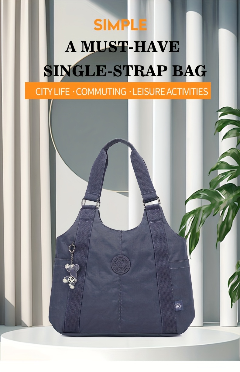 womens   dumpling bag large capacity casual nylon tote with zipper closure adjustable shoulder strap and metal rings versatile black bag for daily   and travel featuring a   Product details 0