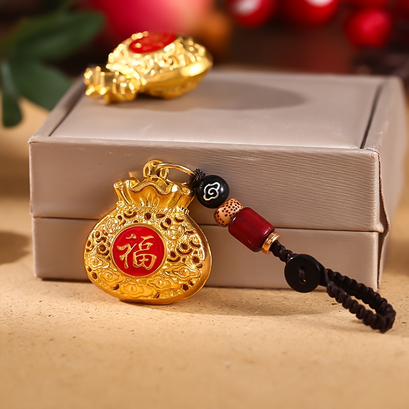 

1pc Charm Golden-tone Keychain With Intricate Chinese 'fu' & Red Bead Accent - Copper Alloy, New Year Accessory For Car Keys & More