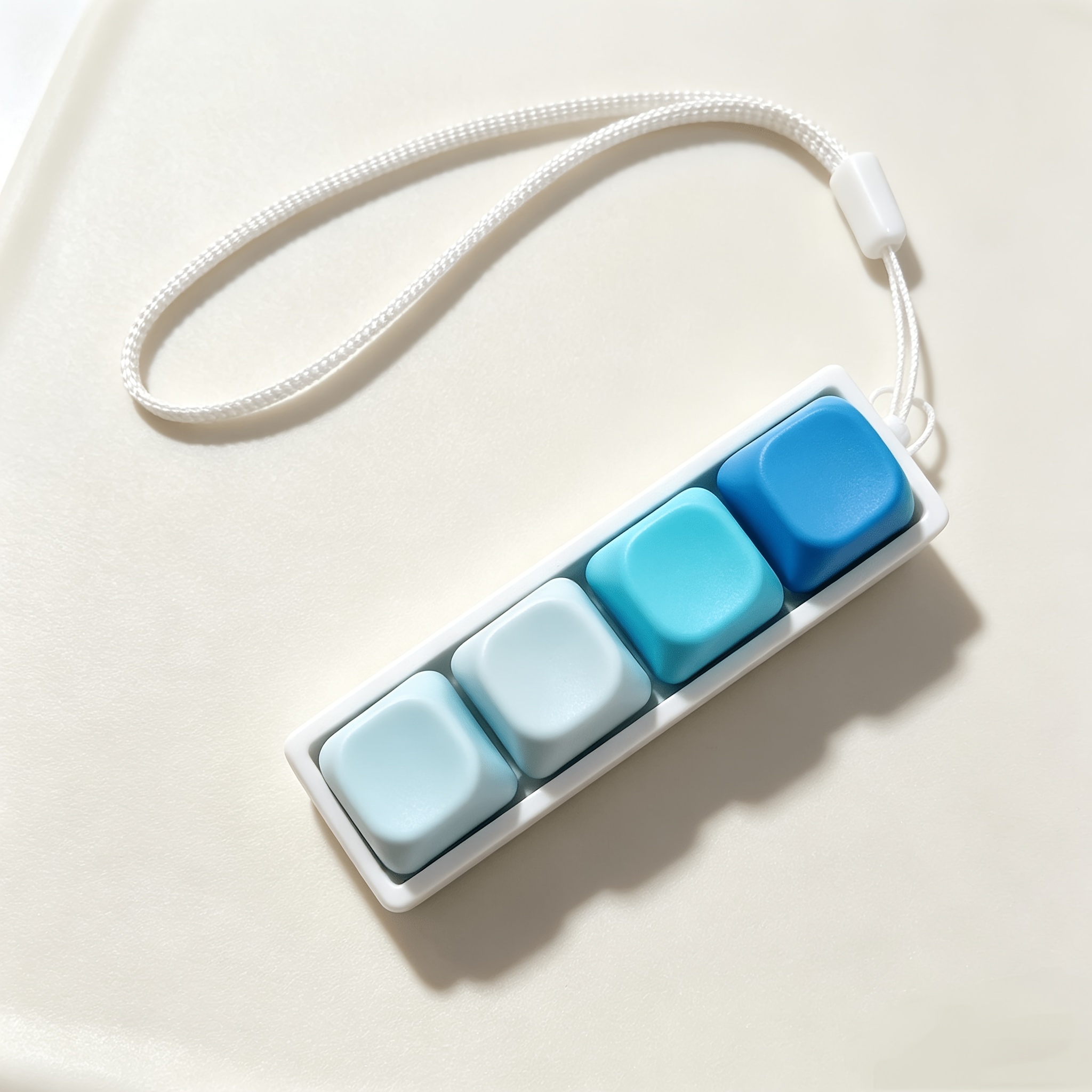 TEMU Porte-clés avec pendentif à 4 boutons dégradé bleu glace, porte-clés de Noël amusant avec bouton de soulagement à pression pour les doigts