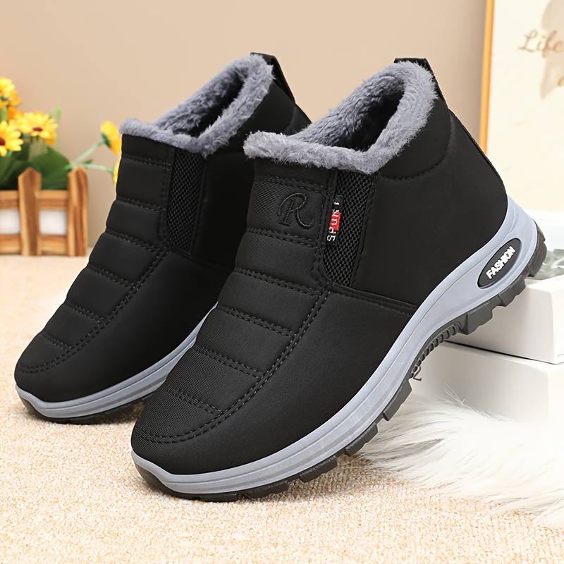 mens winter footwear featuring warm fleece lining non slip ankle design and plush   ideal for outdoor hiking and trekking Product details 4