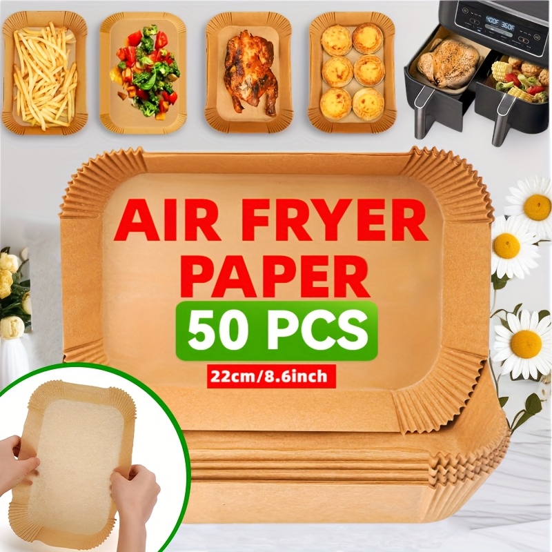 50 pack pre cut air fryer liners 22x14cm non stick baking paper for dual basket fryers heat resistant disposable sheets rectangular value bulk set for easy clean reuse