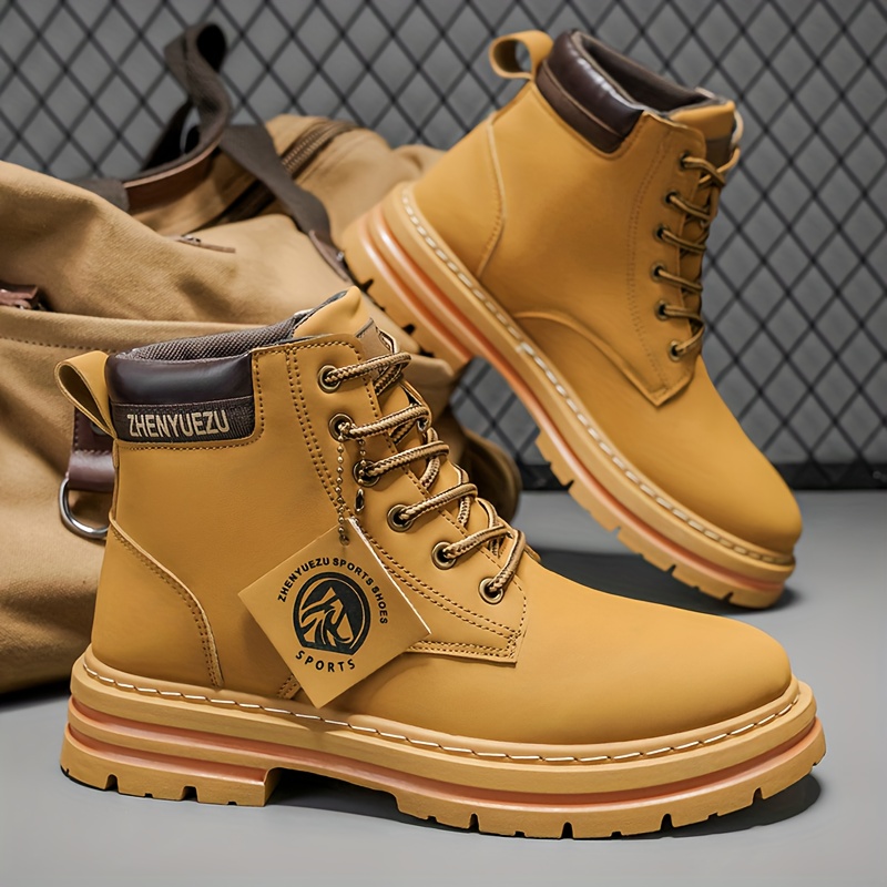 a pair of mens hiking boots trendy and versatile casual mens shoes suitable for daily   and college style outfits the tongue features two random patterns and     features two random patterns