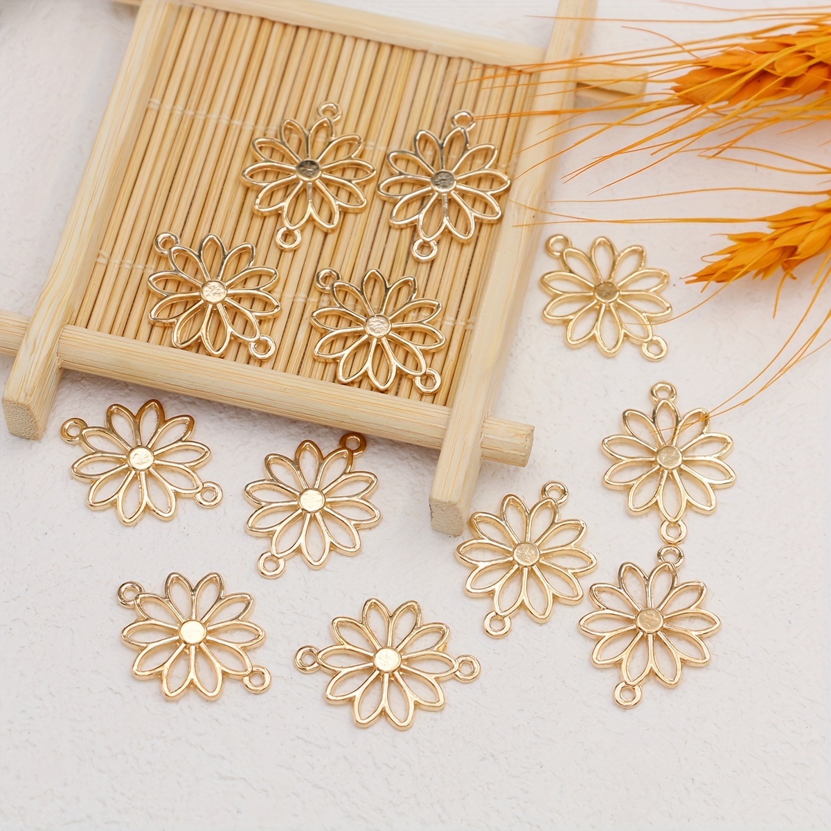 Image of Set Of 12 Flower-shaped Charms With Hollow Designs, Perfect For Your Own Jewelry Like Necklaces, Earrings, And Bracelets.