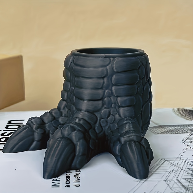 TEMU Porte-stylo créatif et amusant de griffe de dinosaure imprimée en 3D, disponible en plusieurs couleurs. Un porte-stylo créatif et un ornement de
