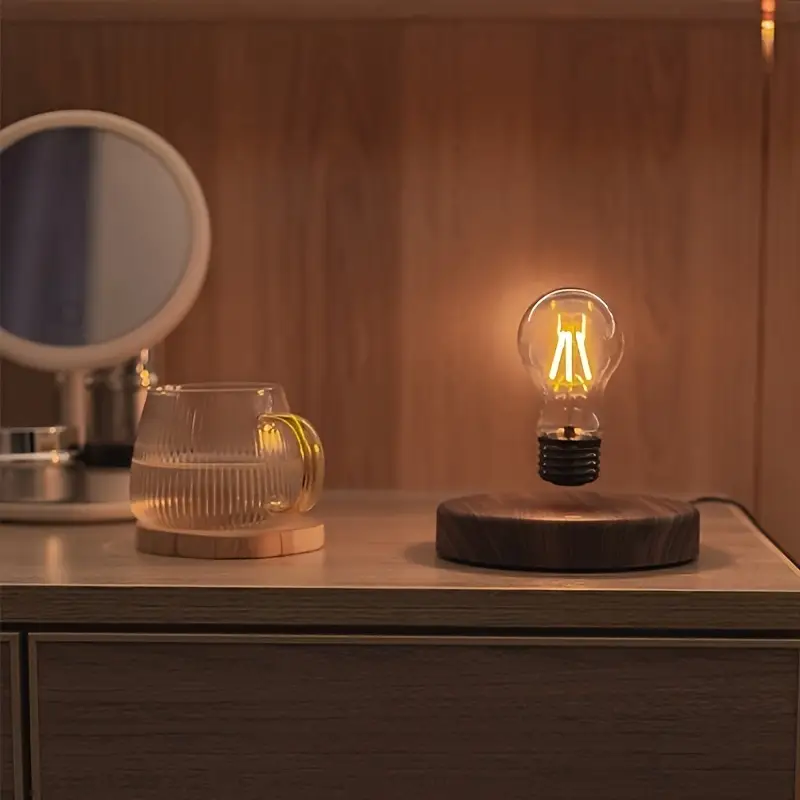 wholesale price abs plastic magnetic floating light bulb warm yellow led table light for room office details 2