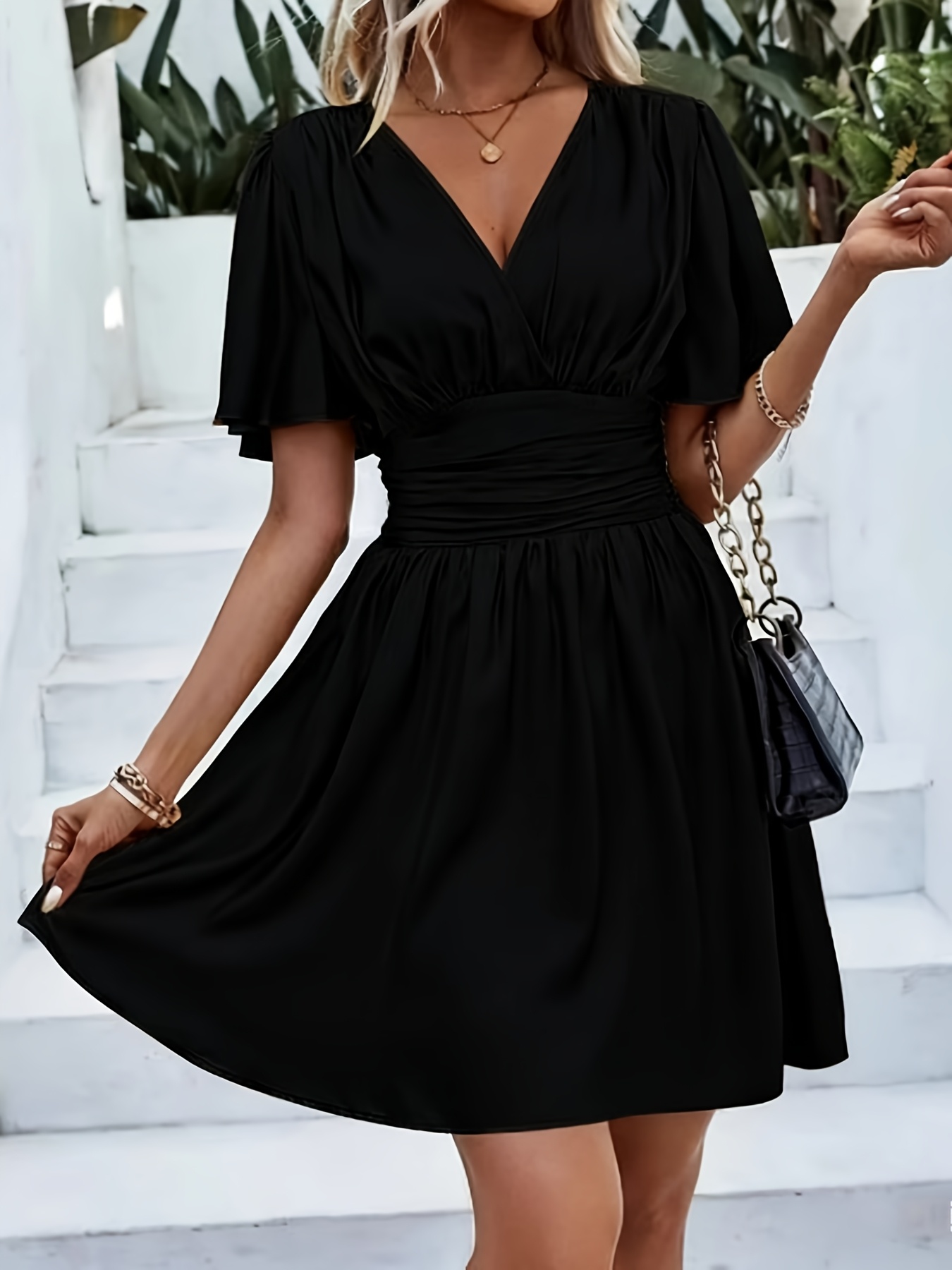 woman black dress sold on Temu United States