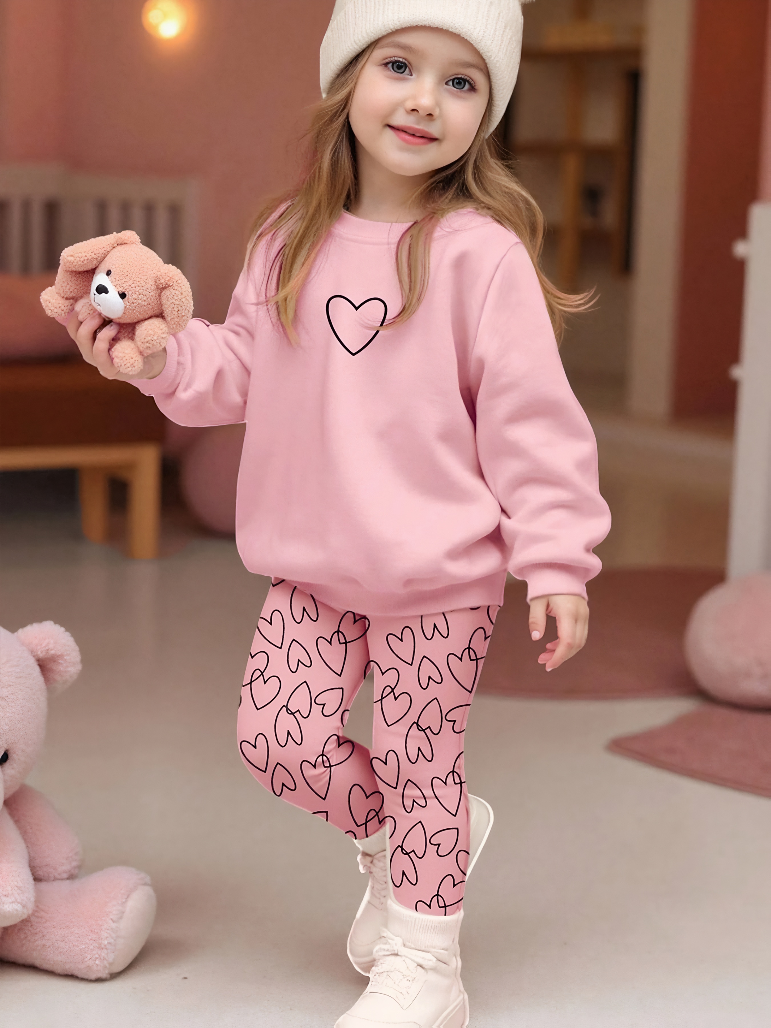 2 piece set girls round neck sweatshirt with long pants set featuring a round neck drop shoulder long sleeve sweatshirt and heart print pants ribbed cuffs design simple and fashionable style suitable for girls aged 1 8 to wear  