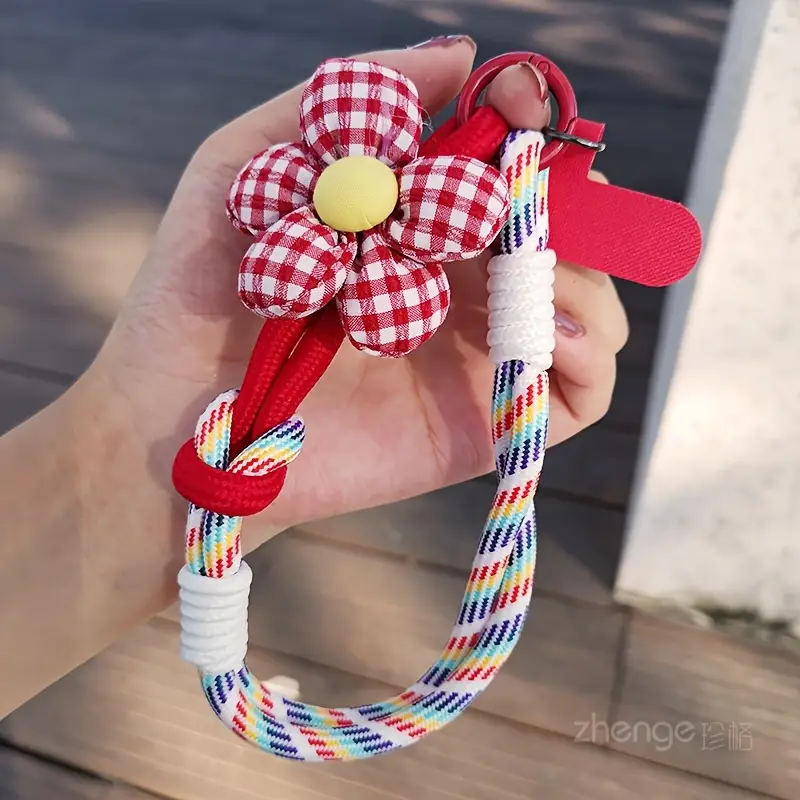 Foto de Strap/correa de mano adaptable a cualquier celular.