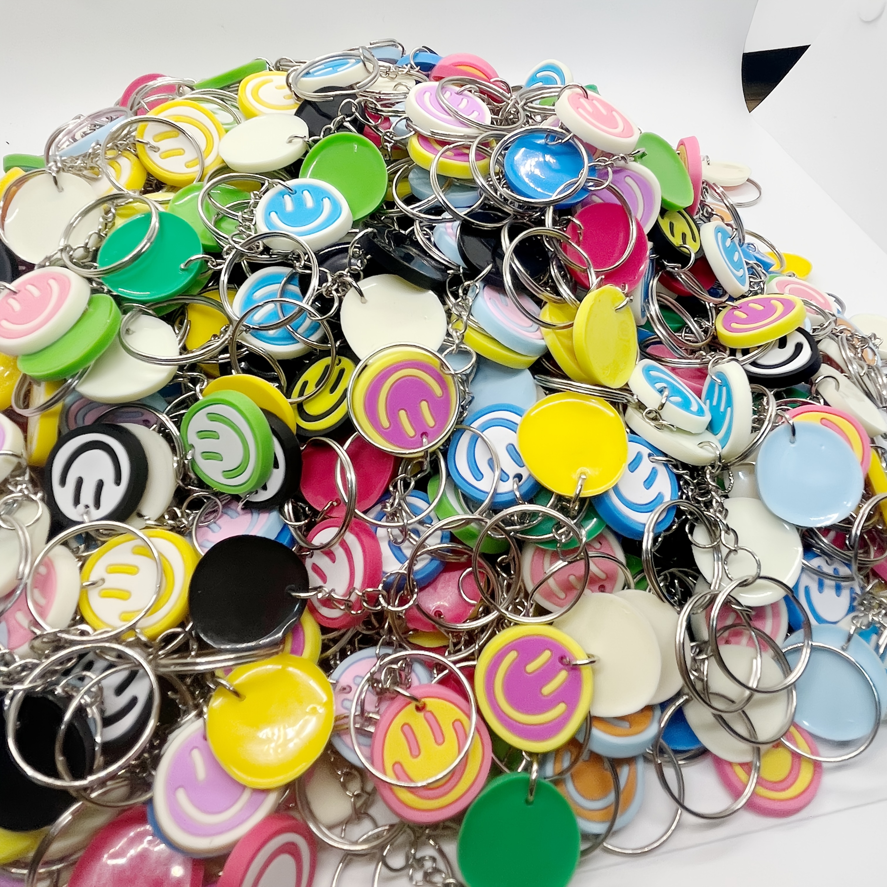 Image of 50pcs Cross-border Cute Mixed Pvc Happy Face Keychains, Multi-style Assortment For Birthday Party Supplies And Gifts, Vibrant Colors, Ideal For Prizes And Gifts
