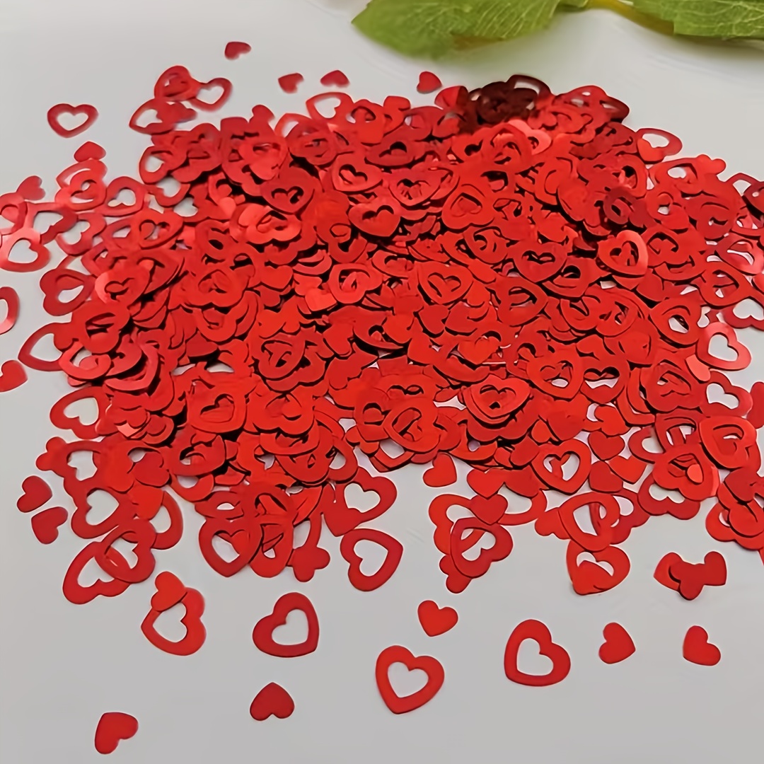 Image of 1080pcs Of Red Heart-shaped Confetti - Perfect For Valentine's Day, Anniversaries, And Weddings | Pvc Heart Glitter For Romantic Table Decor And Celebrations