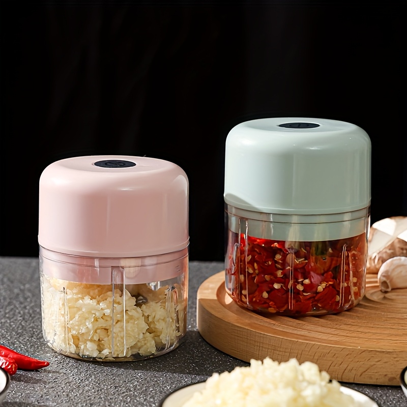 3 color options compact electric garlic press for home and restaurant use with stainless steel blades quickly crushes garlic and ginger ideal for   food preparations Product details 3
