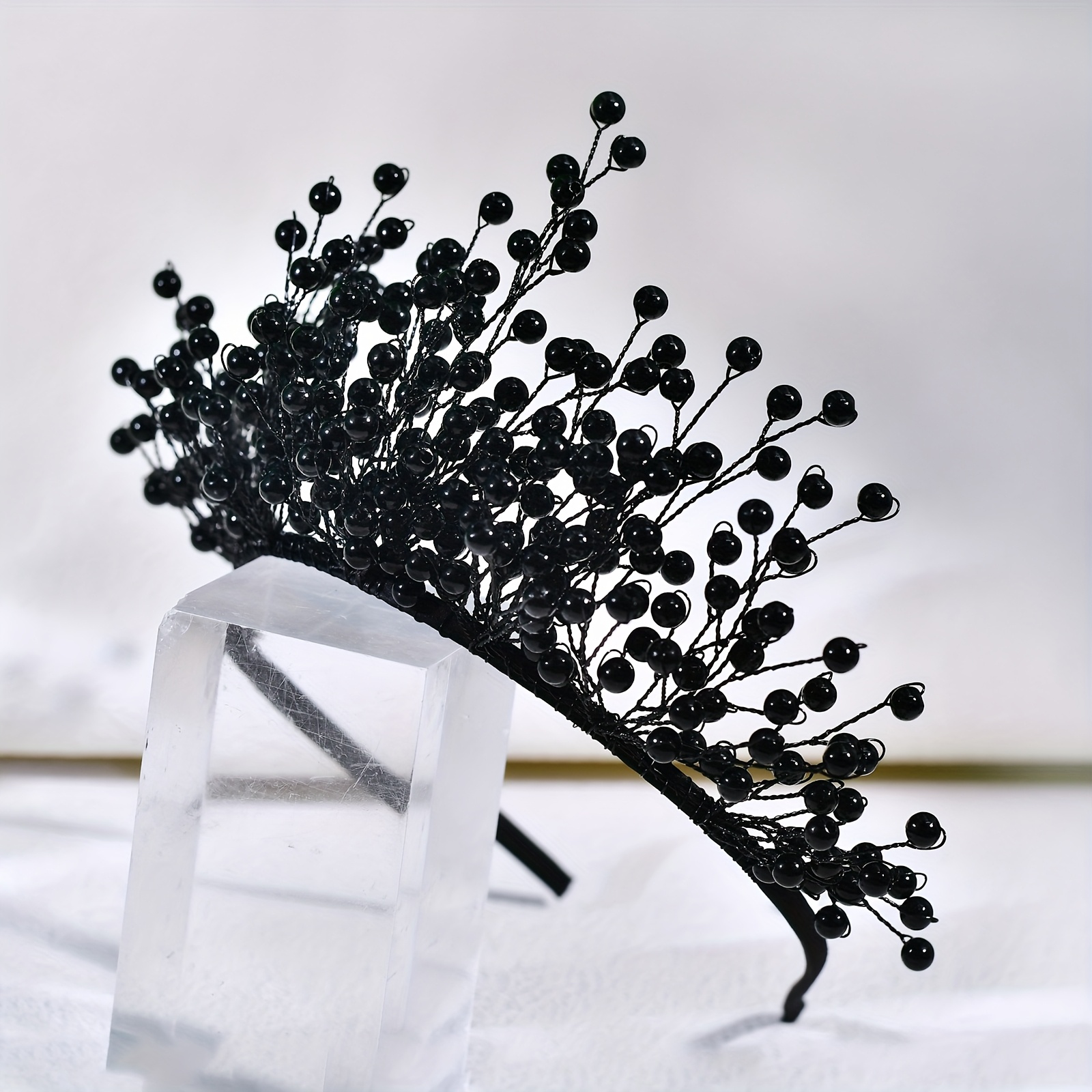 Image of A Handmade Headband Featuring A Small Elegant Crown, Perfect For A Black-themed Party Accessory
