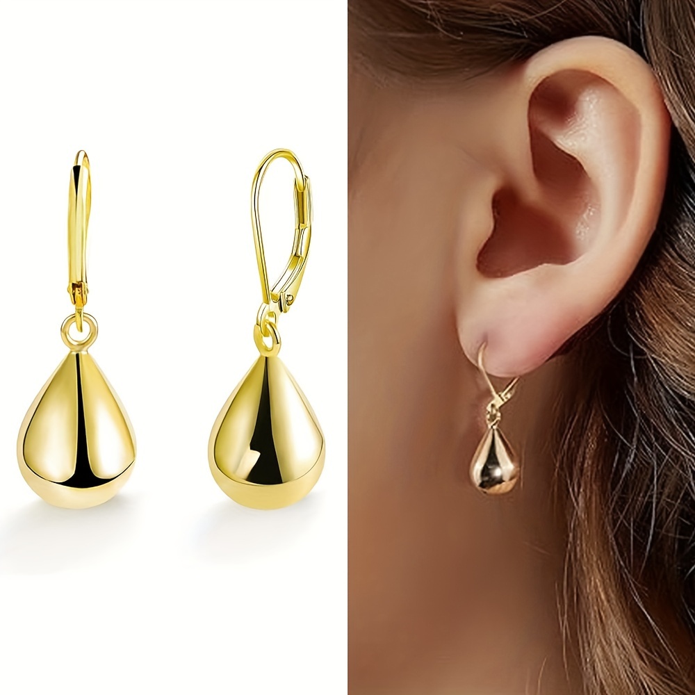 

A Pair Of 925 Earrings With Teardrop Pendants, Elegant And Suitable For Or Parties, Making A For .