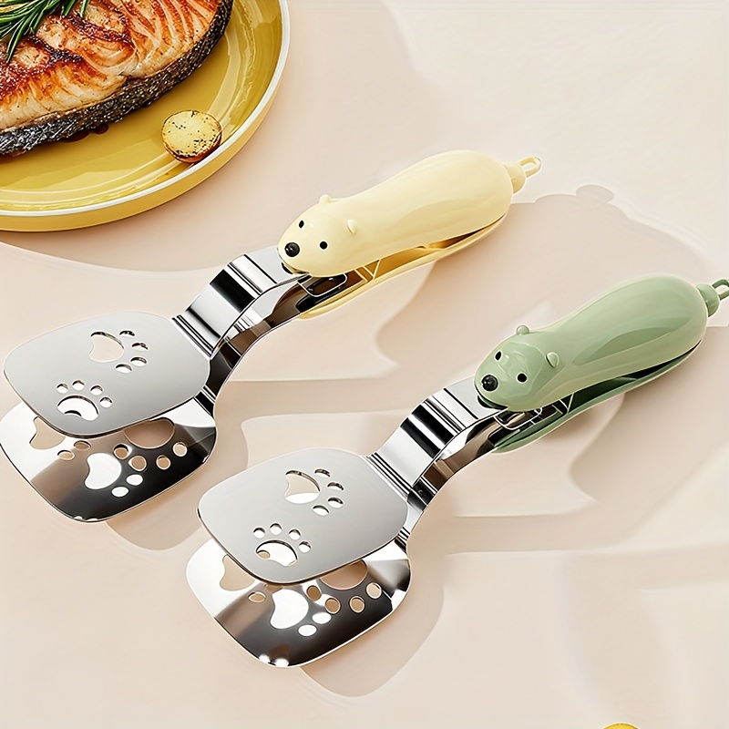 stainless   spatula for home use portable kitchen tool that   used as   a clamp and a spatula multifunctional kitchen utensil Product details 0