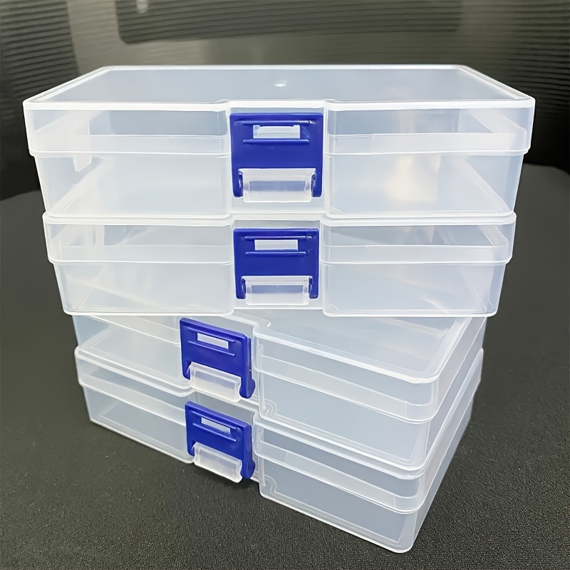 

A Set Of 5 Transparent Plastic Storage Boxes With Blue , For Sewing, Beads, Laptops, Toys, And Art Supplies.