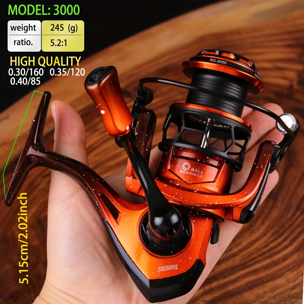 Orange Spinning Reel With Stainless Steel Spool, Brass Gears, And Hollow Aluminum Cup. In 1000, 2000, And . Features A Loud Audible Alarm System And Design, Ideal For Freshwater And Saltwater Fishing