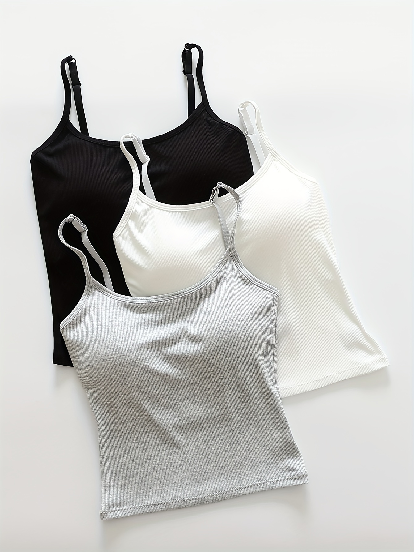 a set of three womens camisoles with built in padding designed for casual wear without the need for     in   colors for summer