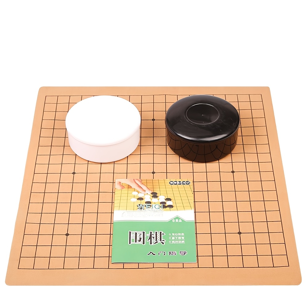 

A Go Set For Elementary School Students, Featuring A 19x19 Board With Pieces For Beginners In And Chinese Chess.