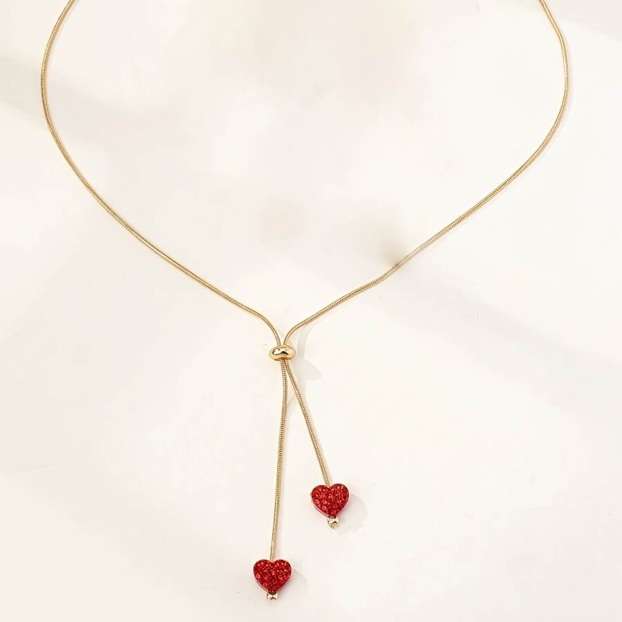 A Easy And Stylish Elegant Collarbone Chain With A Heart Pendant And Tassels, Perfect For Women To Wear As Neck Jewelry On Valentine's Day