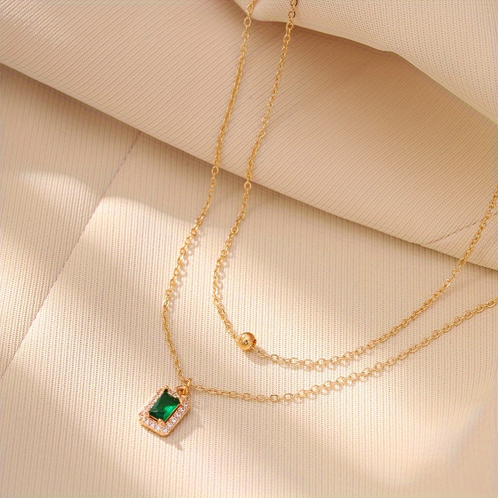 A Set of Two Stylish Classic Thanksgiving Necklaces Featuring Rectangular Pendants Inlaid with Zirconia Stones, Perfect for Layering, Along with Copper Bead Pendants, Making It an Ideal Gift for Women