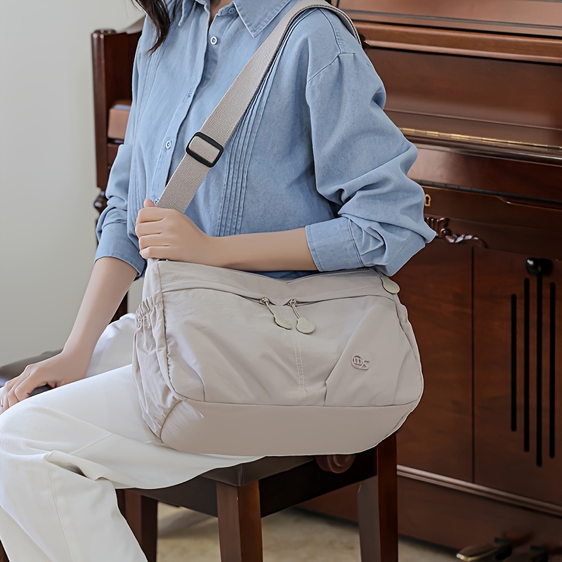 womens large capacity multi tier nylon bookbag adjustable crossbody backpack school bag with zipper closure hand washable casual travel backpack suitable for college outdoor grey Product details 1