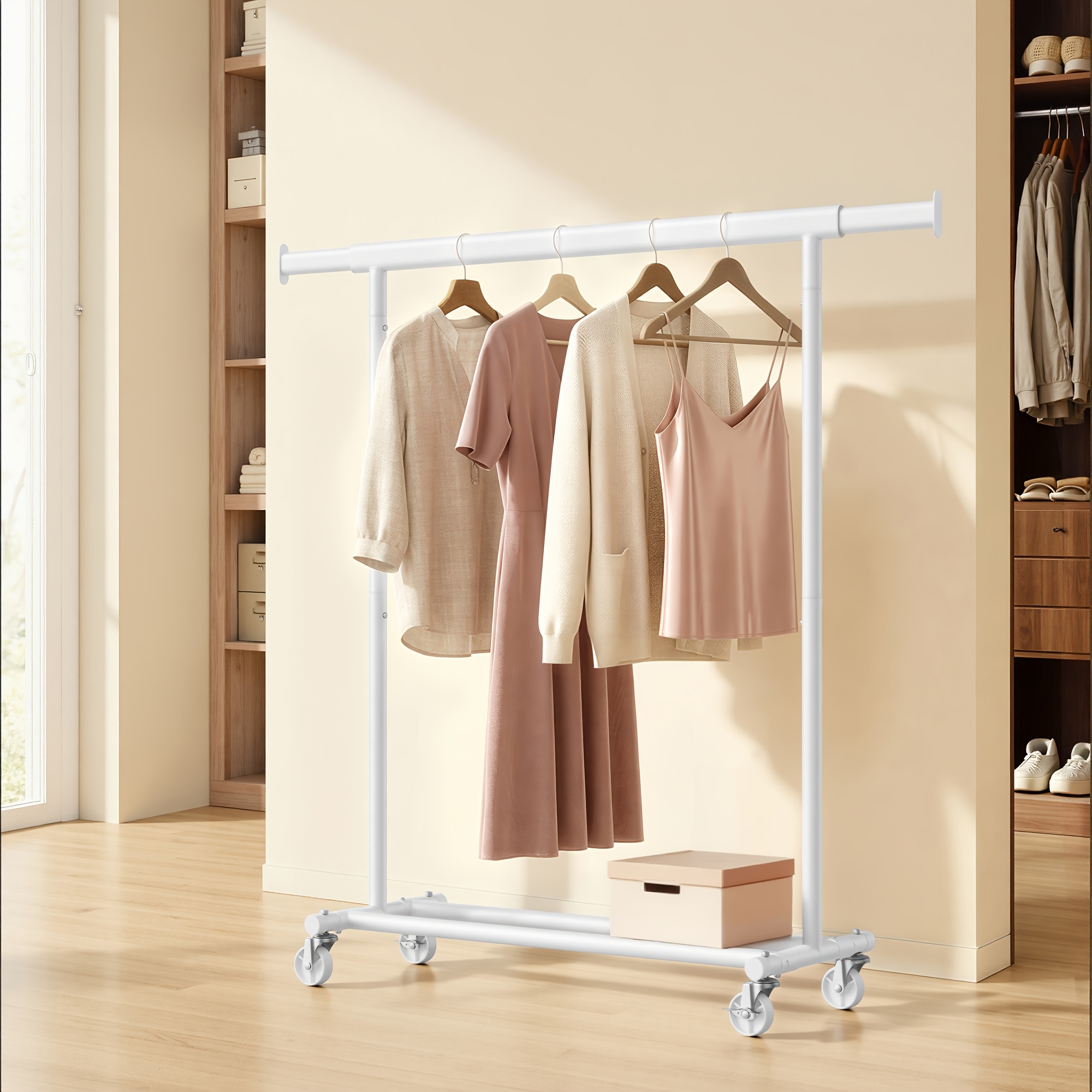 TEMU Portant à vêtements autoportant blanc avec roulettes, avec une tringle télescopique réglable de 92 à 132 cm. Dimensions totales : de et 161,5 cm