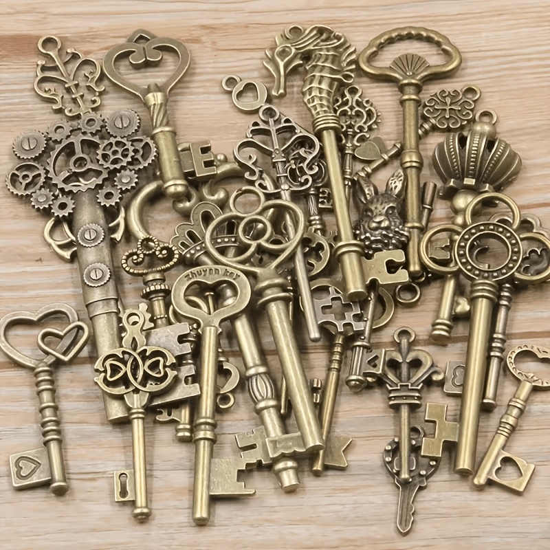 TEMU Juego de colgantes para llaveros de , estilo y cantidad aleatorios, para manualidades - Colgantes surtidos de metal hermosos diseños para hacer