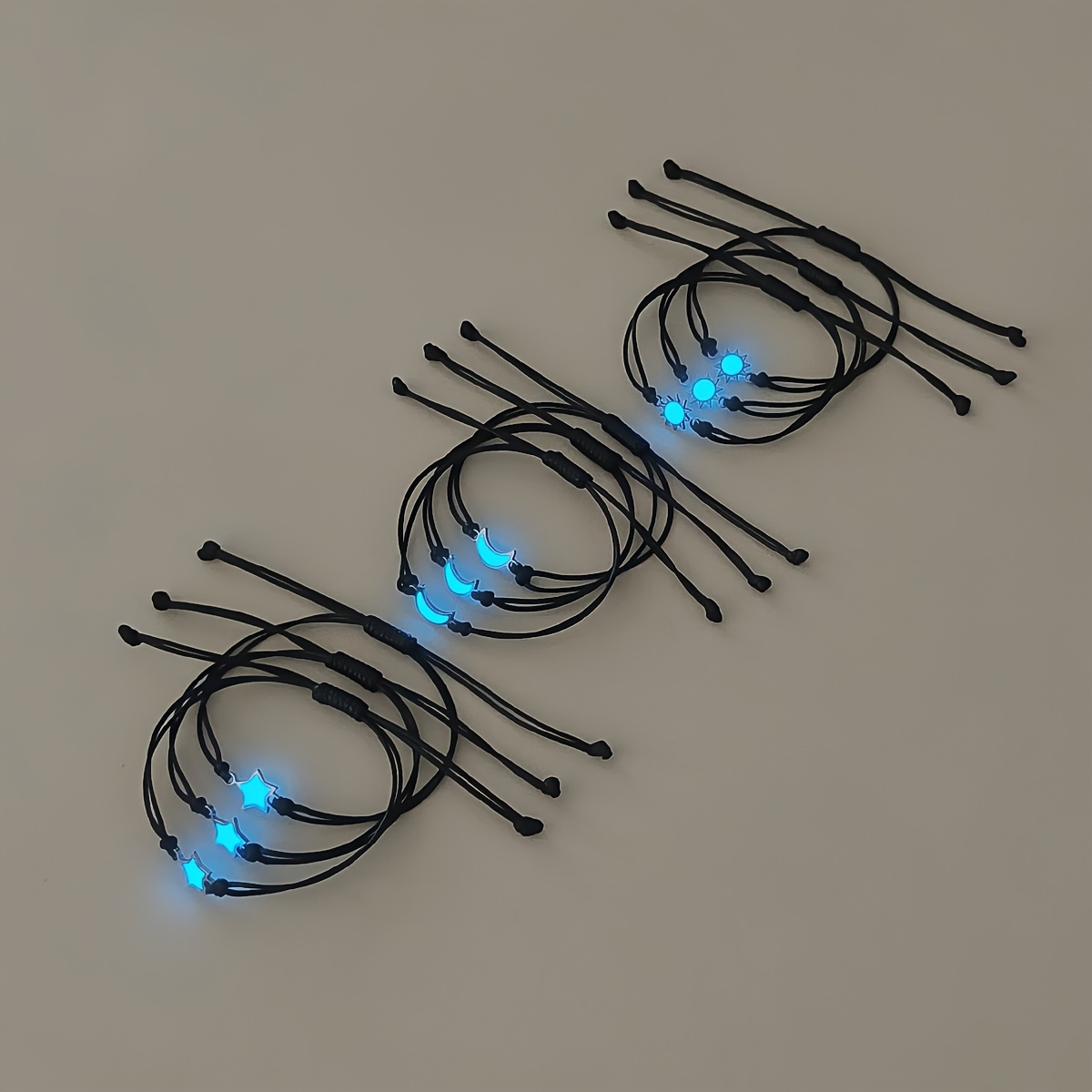 Image of 9pcs/set Of Night-luminous Sun, Moon And Star-shaped Bracelets, Festival Gifts, Family Gifts, Design Sense Bracelets