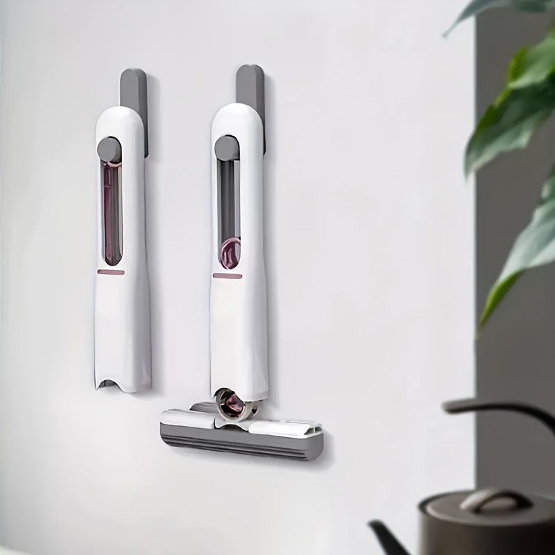 Handheld Multifunctional Cleaner, Equipped with Replaceable Mop Heads And a Hook. The Rotating Mop Head Allows for Easy And Forceful Cleaning of Gaps And Corners in Sinks, Pet Urine, And Desktop Debris. A Portable Marine Cleaning Mop/Tool.