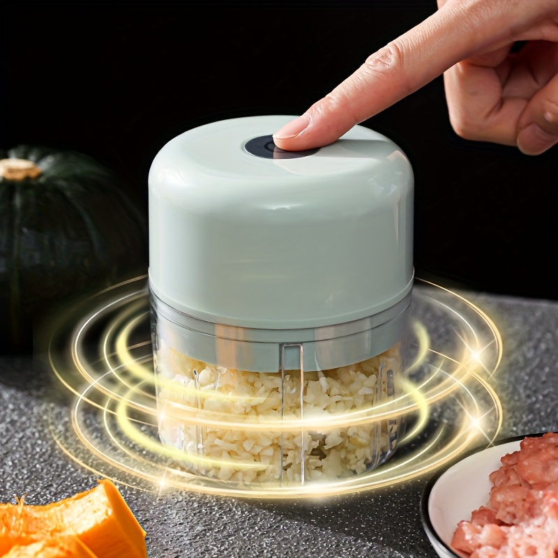 3 color options compact electric garlic press for home and restaurant use with stainless steel blades quickly crushes garlic and ginger ideal for   food preparations Product details 5