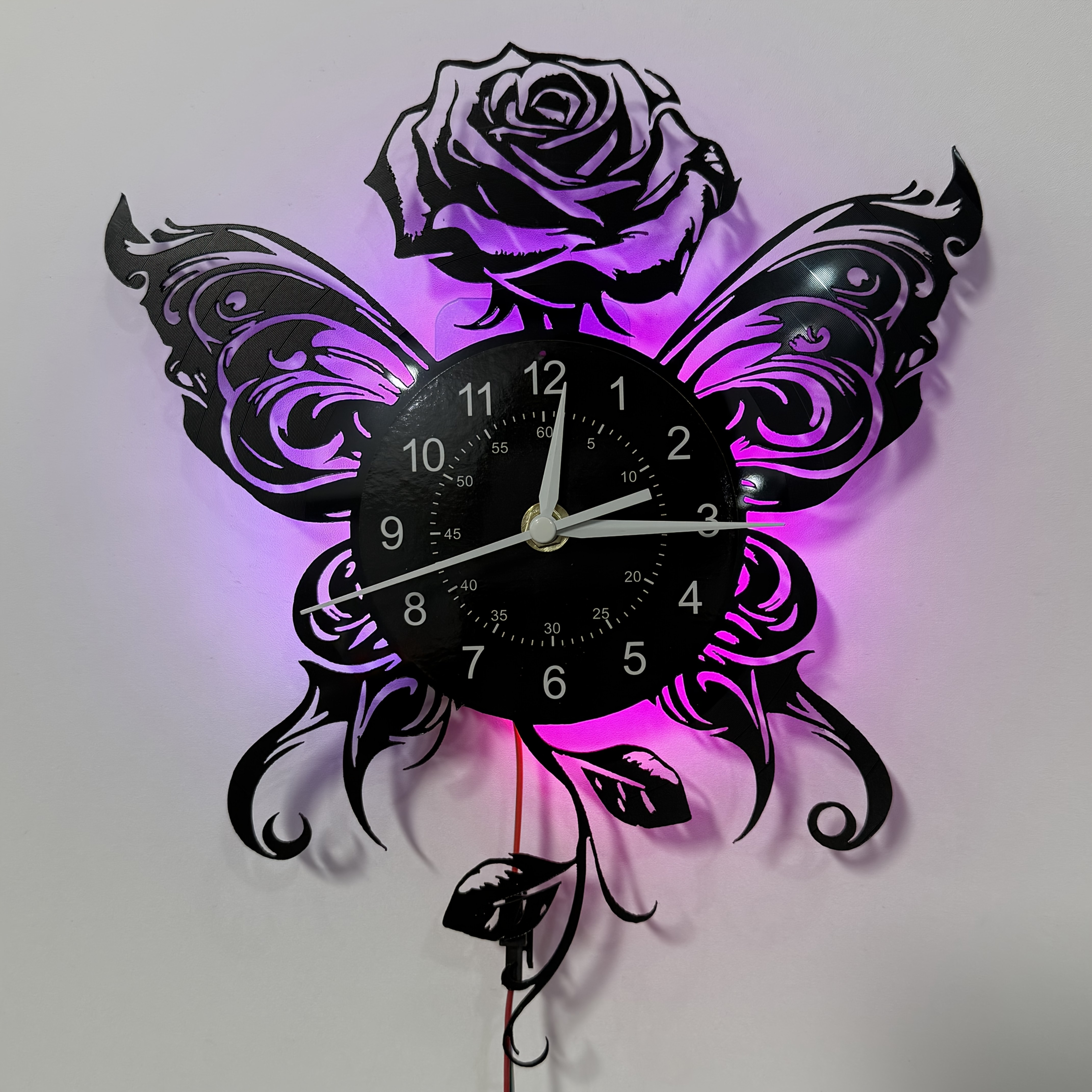Image of A Record Wall Clock Featuring A And Rose Theme, Perfect For Decorating Living Rooms, Bedrooms, And Spaces Like Cafes, Restaurants, And Offices. It Makes A Unique Gift For On Any Occasion