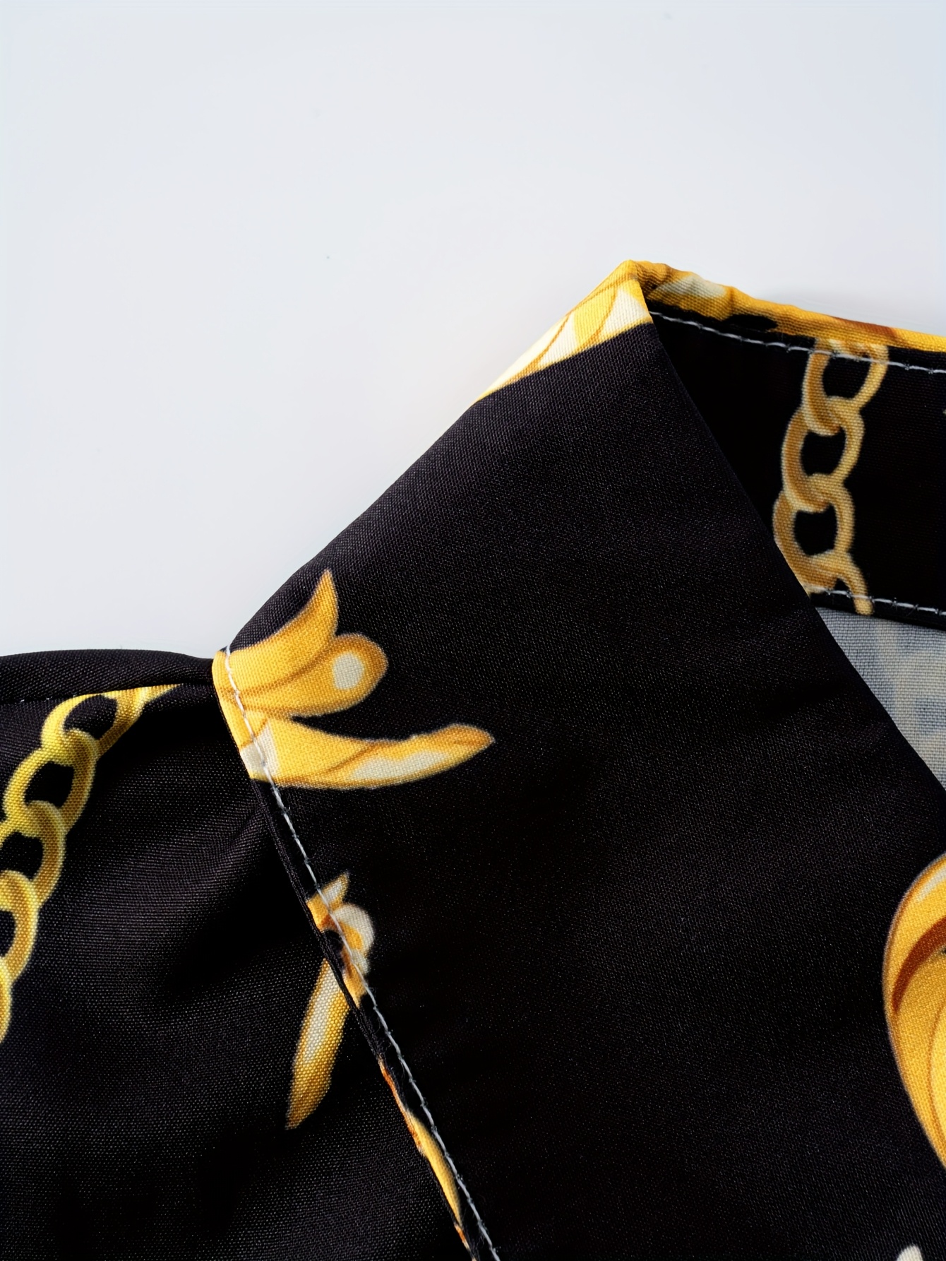 a long sleeved dress featuring a black golden baroque - Temu Oman